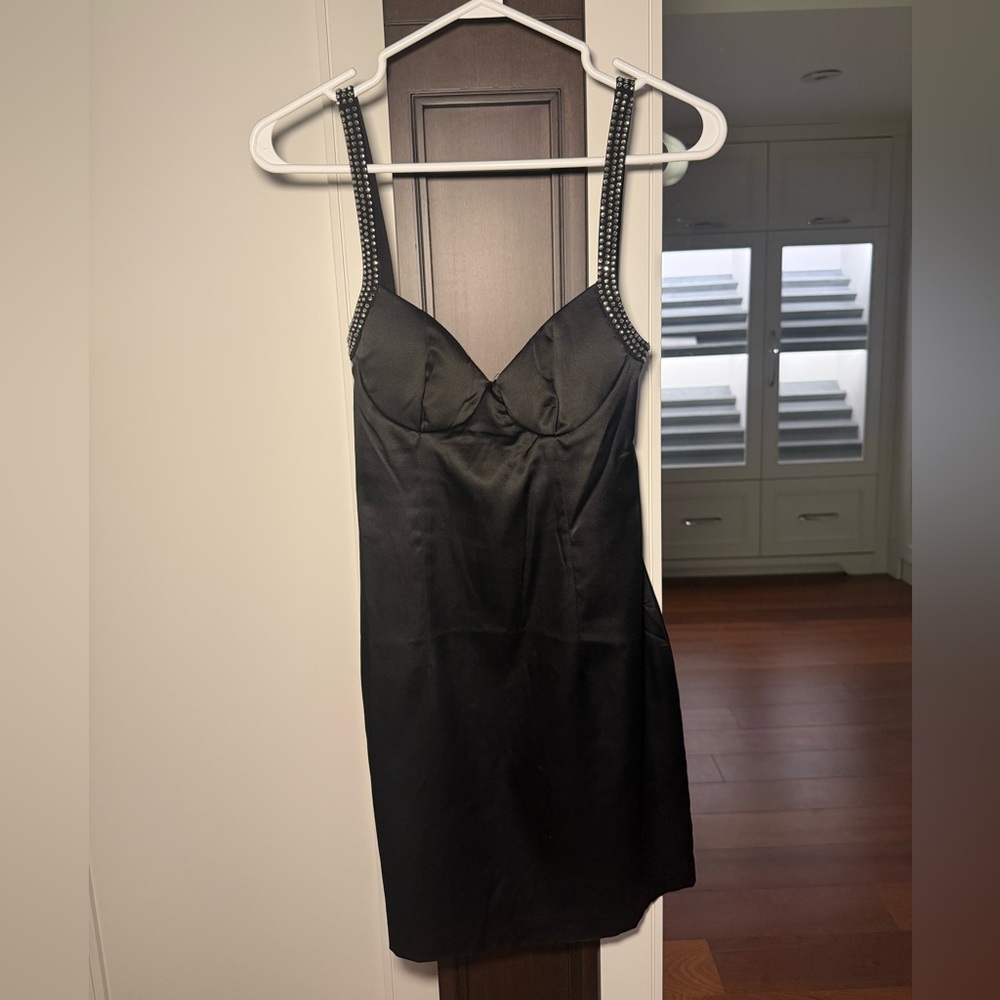 Elegant Black Dress with Embellished Straps